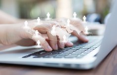 Closeup of business woman hand typing on laptop keyboard Closeup of business woman hand typing on laptop keyboard