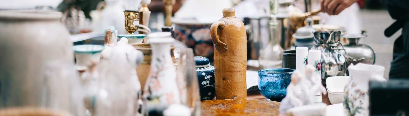 antique pans and pots at the street market in sweden