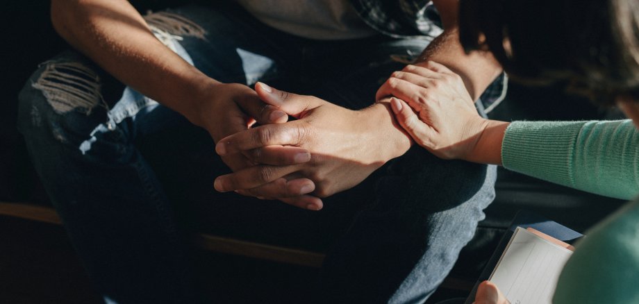 People support each other in a rehab session