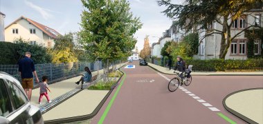 Das Bild zeigt eine Visualisierung als Überblendung der Herzbergstraße. Zu sehen ist unter anderem eine Grüninsel, neue Fahrbahnmarkierungen und die Parkplätze als Rasengittersteine.
